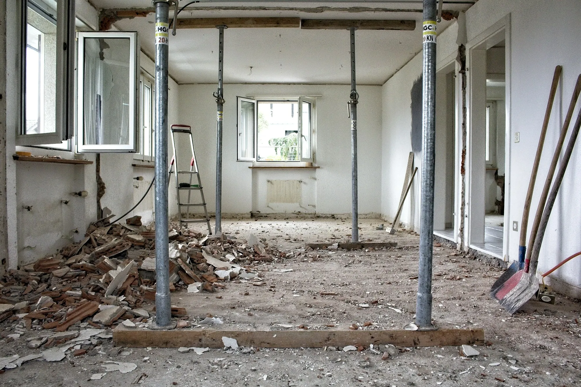 Empty room with temporary supports during renovation