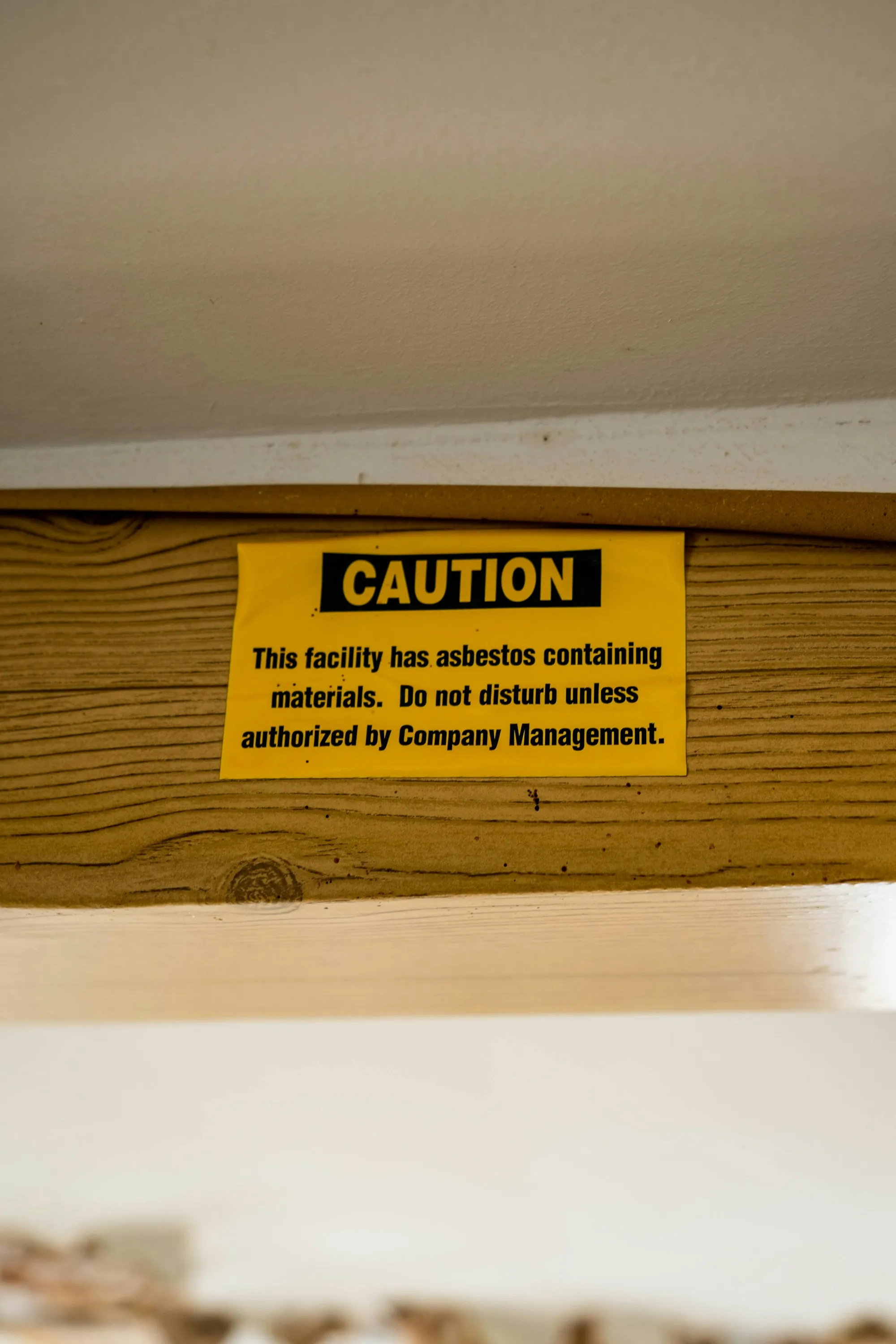 Caution sign about asbestos-containing materials